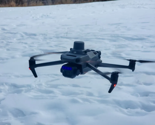 MAVIC 3 Drone flying over snow